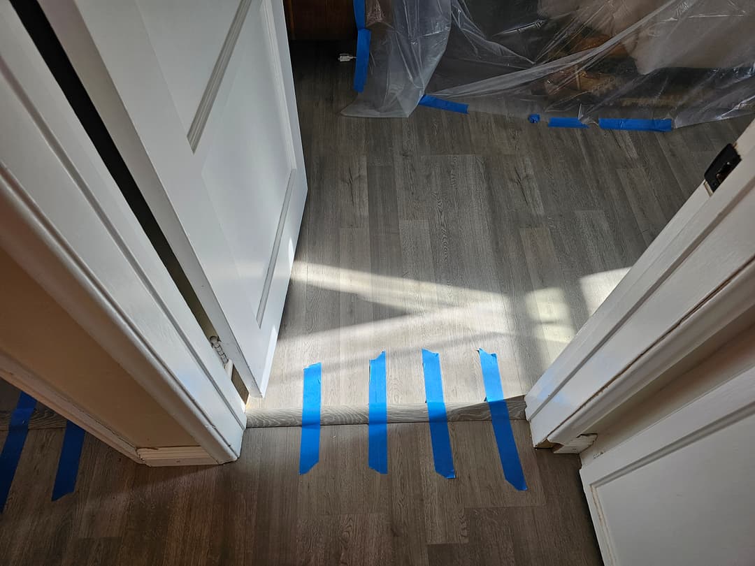 Installing laminate flooring next to a door